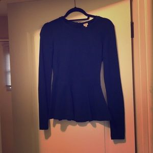 Long sleeve peplum navy blue shirt.